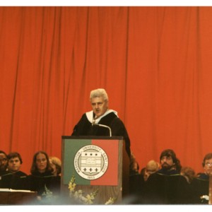 Howard Nemerov speaking at a Washington University graduation