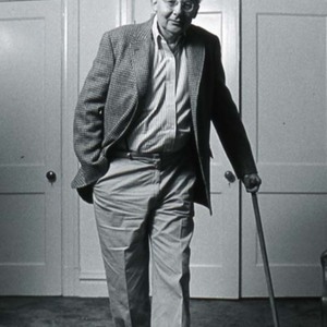 Stanley Elkin leaning on his cane
